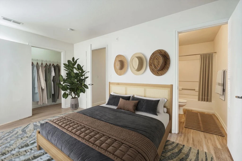 Bedroom with private bathroom and walk in closet